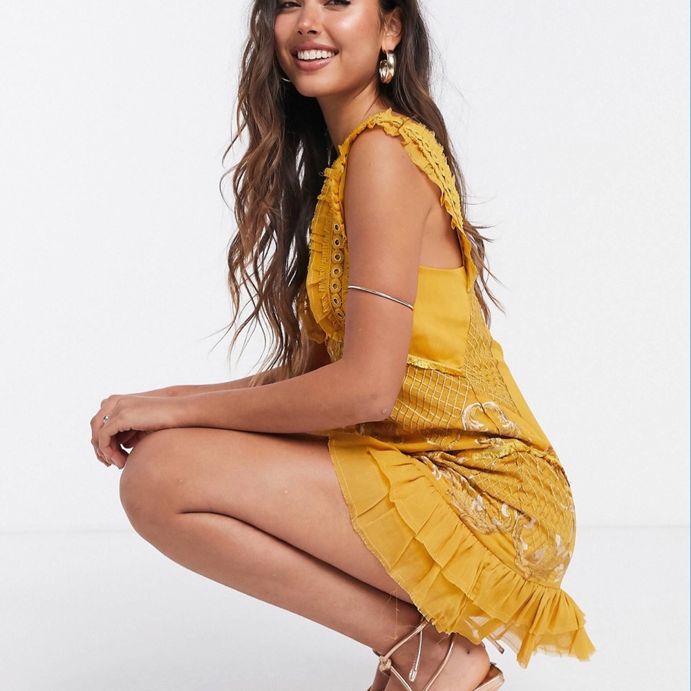 Mini dress with eyelet trim and embroidery